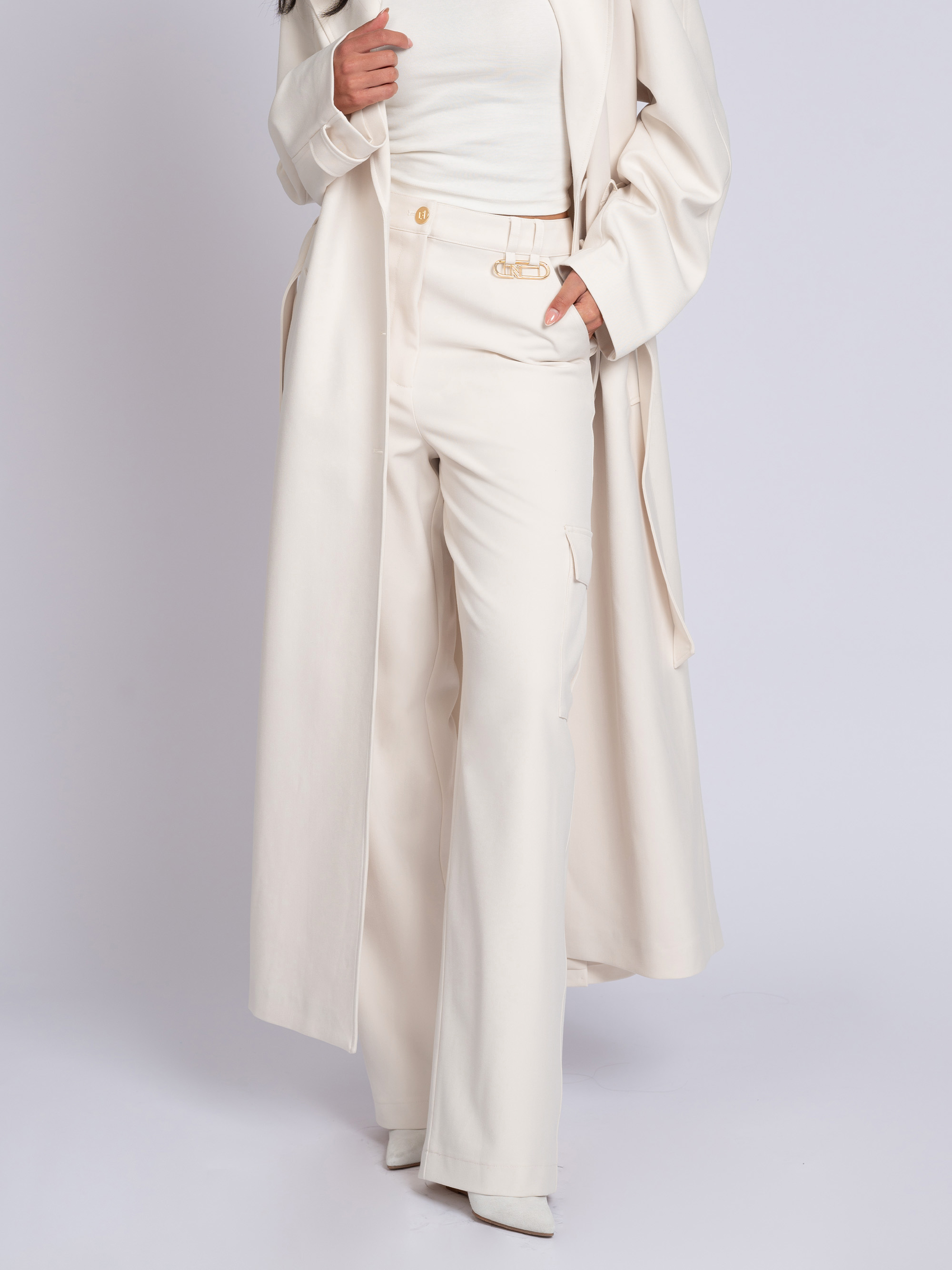 Loose pants with logo detail and flap pockets