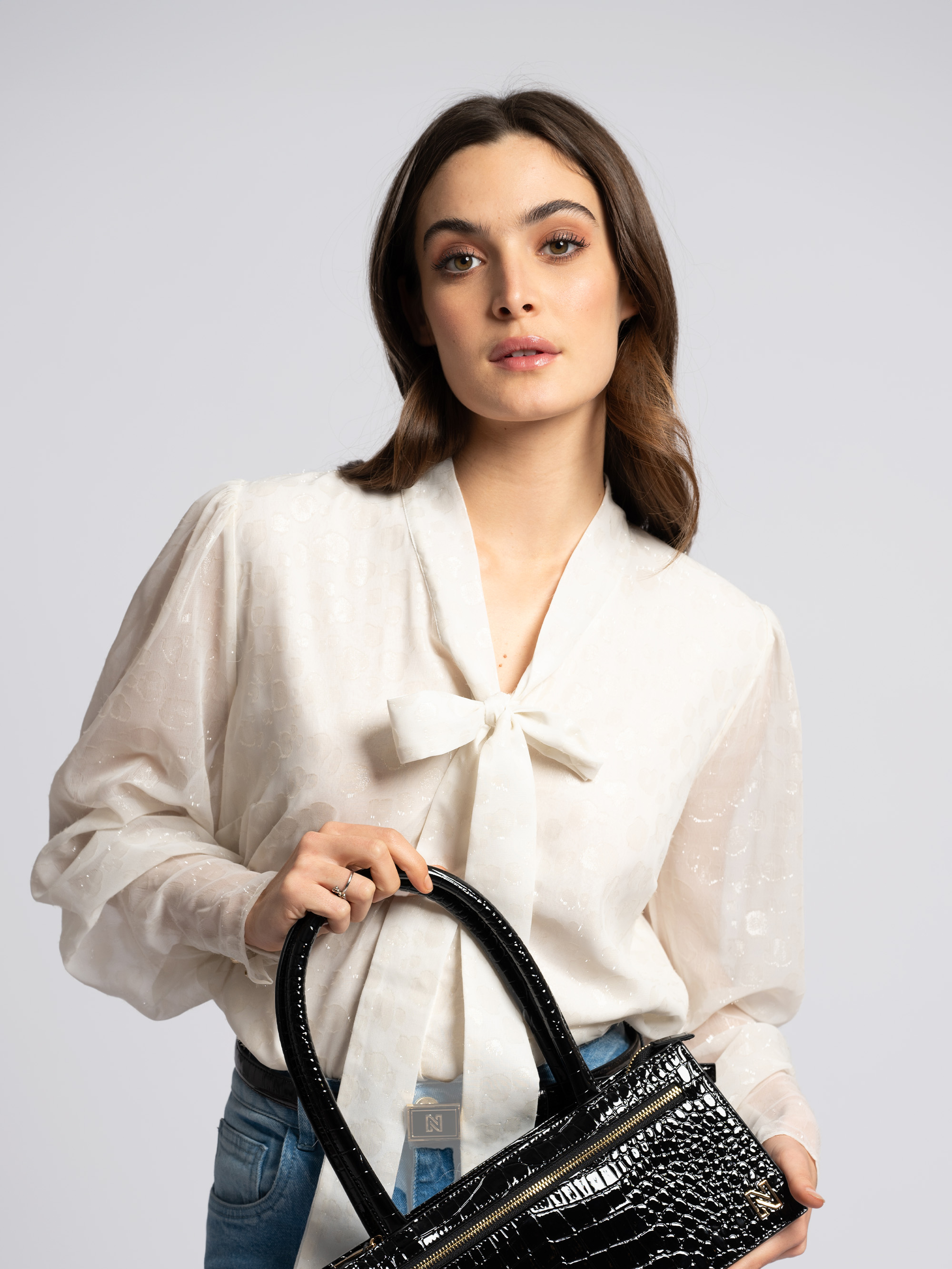 Blouse with tie closure at neck