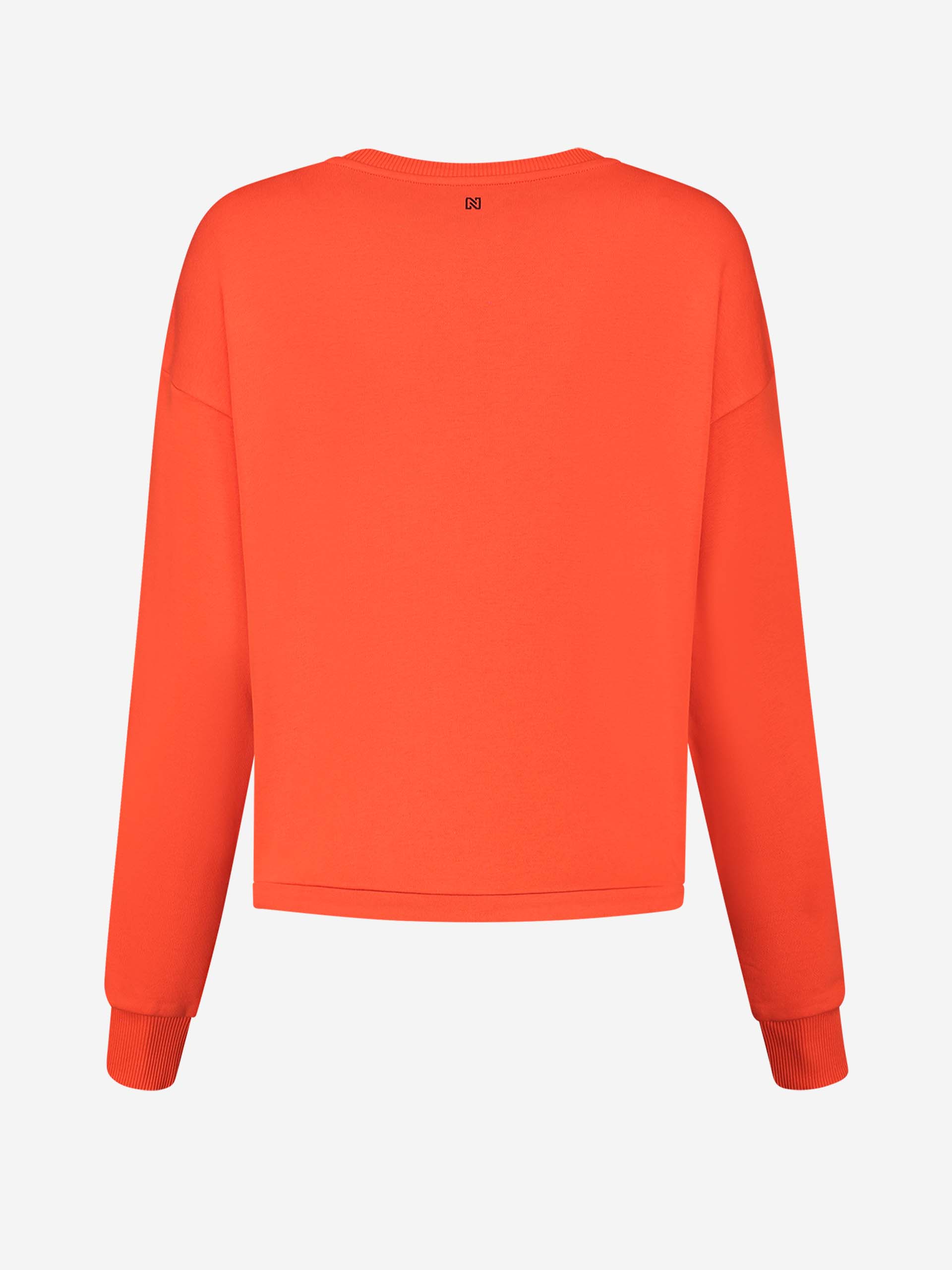 NIKKIE Drawstring Sweater
