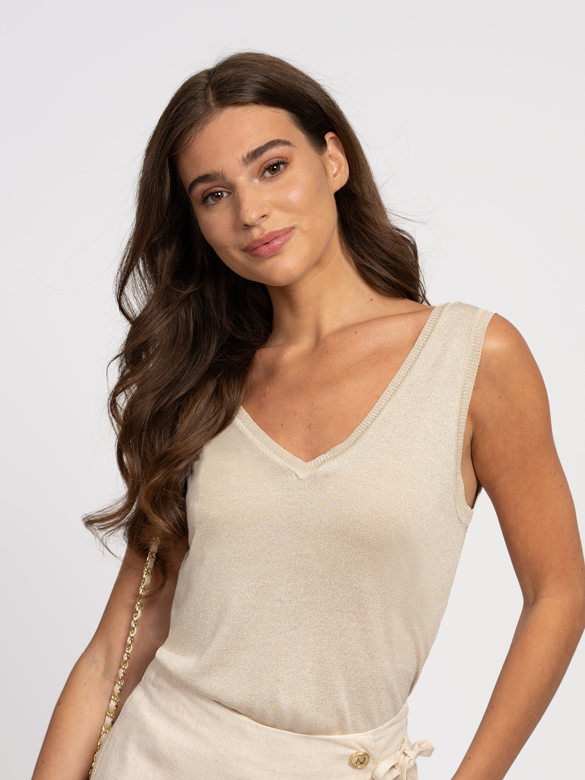 Loose top with glitter thread