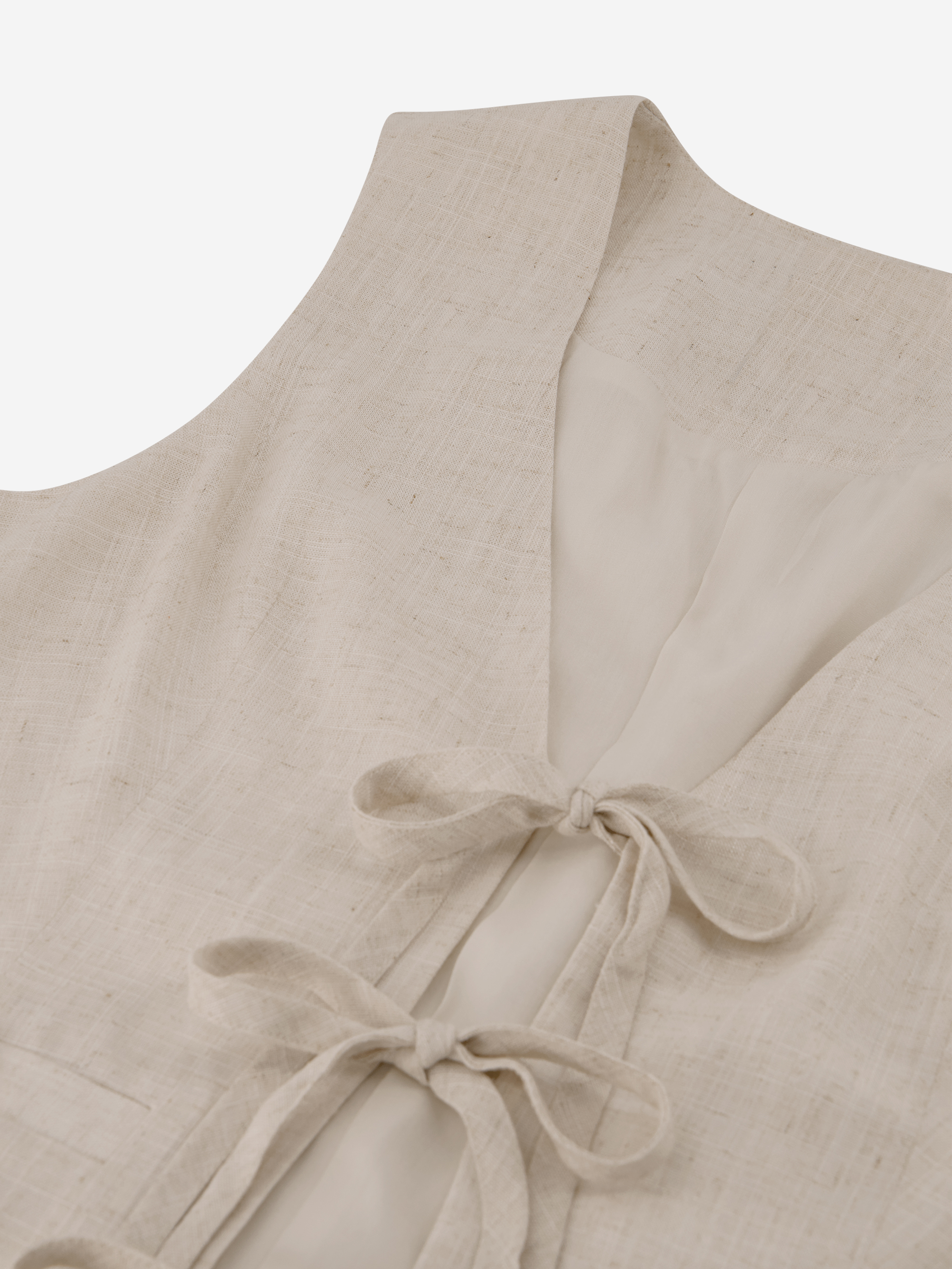 Mixed waistcoat with bow details