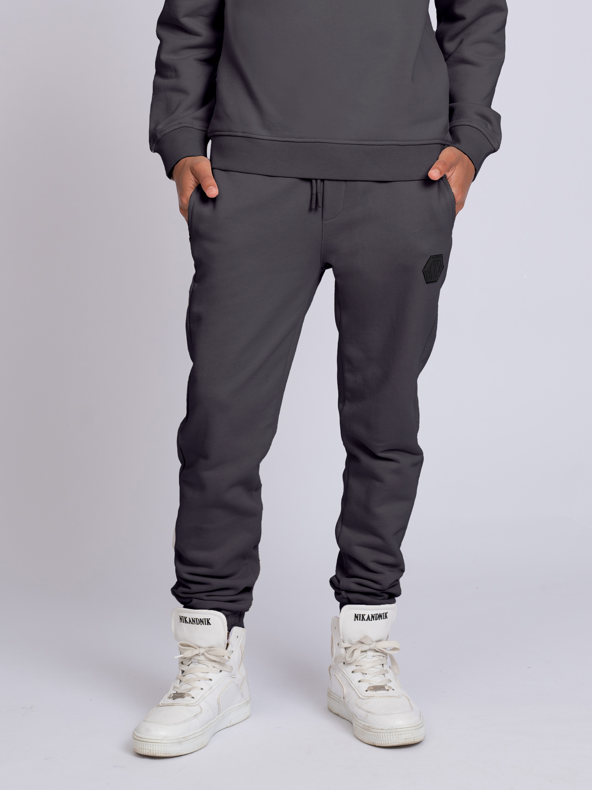 Joggers with elastic waistband and logo patch